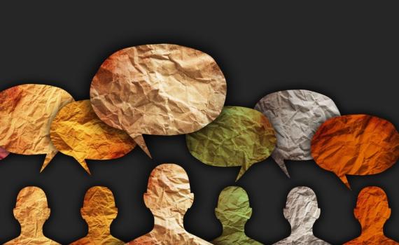 A photo of multi colored silhouettes with thought bubbles above their heads.